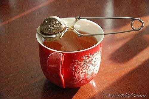 A red cup of red tea.