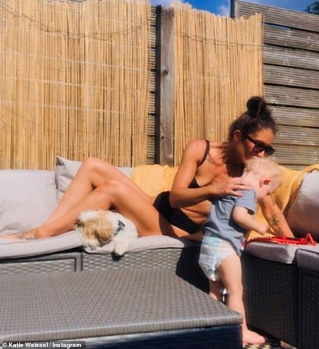 Her pride and joy: In a lengthy caption, the singer revealed that after seeing her before picture, she vowed to rebuild her 'physical strength' for the sake of her 22-month-old son Hudson