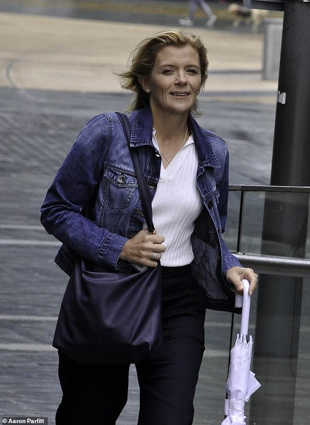 Out and about: Meanwhile, Colson's Corrie co-star Jane Danson put on a cheery display as she braved the rainy weather in Manchester on Wednesday