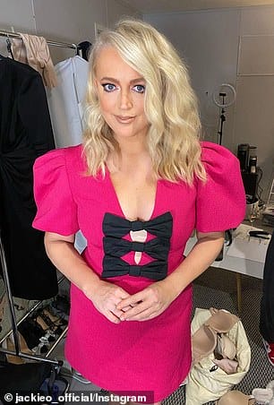 After: The radio presenter looked svelte on Tuesday as she posed in a fuchsia mini dress with black bow detailing down the front