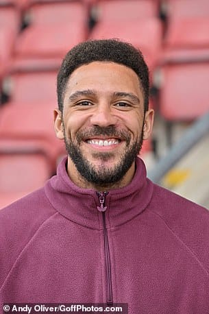 Soap stars: Emmerdale actor Jay Kontzle beamed openly for the camera ahead of the big game, in a burgundy zip-up hoodie.
