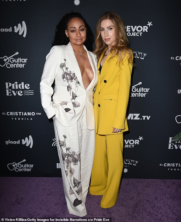 Her other half: Raven-Symoné was joined at The Countdown To Pride campaign bash by her wife Miranda Pearman-Maday, who coordinated with her in a yellow double-breasted pantsuit